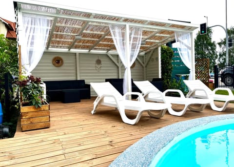 Swimming pool, sunbed