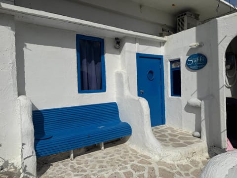 Property building, Patio, Living room, Seating area