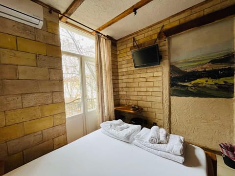 Bed, TV and multimedia, towels, air conditioner