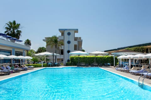 Property building, Day, Natural landscape, Pool view, Swimming pool, sunbed