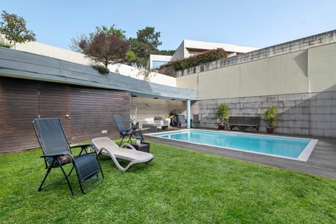 Property building, Living room, Swimming pool