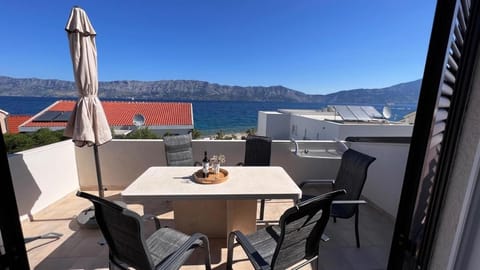 View (from property/room), Balcony/Terrace, Seating area, Mountain view, Sea view