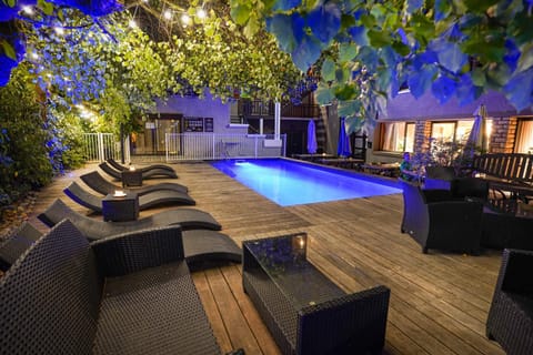 Patio, Night, Natural landscape, Pool view, Swimming pool, sunbed