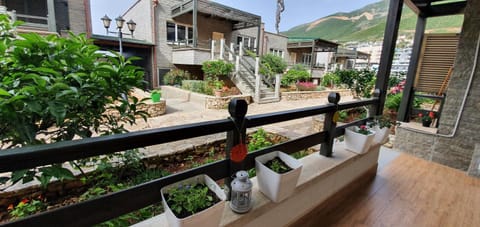 Property building, Patio, Spring, Day, Natural landscape, Garden, View (from property/room), Balcony/Terrace, Garden view, Mountain view