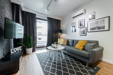 TV and multimedia, Balcony/Terrace, Living room, Seating area, air conditioner, air conditioner