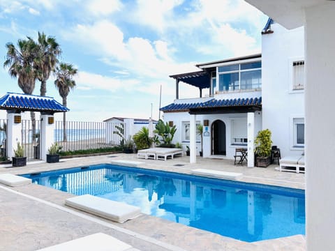 Property building, Beach, Swimming pool