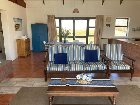 Property building, Living room, Seating area, Dining area