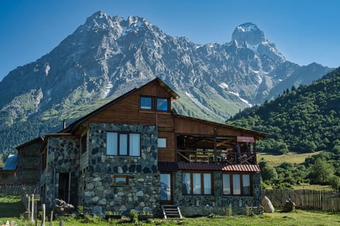 Property building, Nearby landmark, Natural landscape, Mountain view