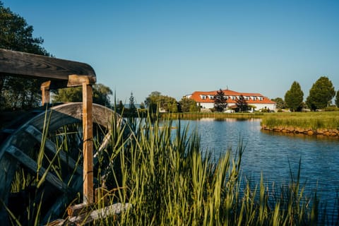 Property building, Nearby landmark, Day, Natural landscape
