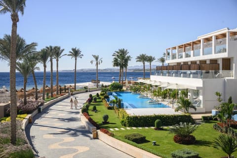 Property building, Day, Natural landscape, Garden, Garden view, Pool view, Sea view, Swimming pool