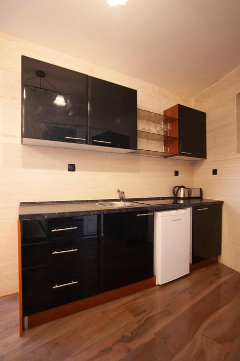 Kitchen or kitchenette, stove