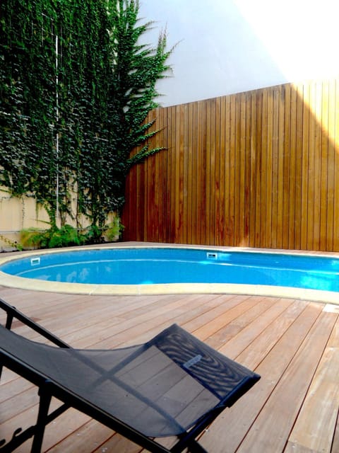 Property building, Swimming pool, sunbed