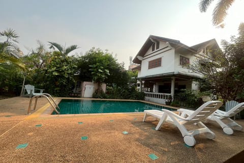 Property building, Pool view, Swimming pool, sunbed