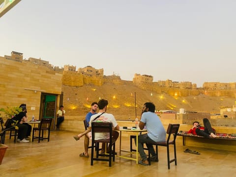 Restaurant/places to eat, View (from property/room), Balcony/Terrace, group of guests