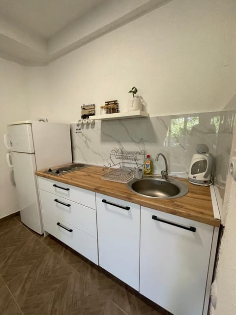 Kitchen or kitchenette, stove