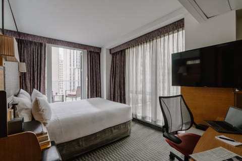 Bed, TV and multimedia, Seating area, Bedroom
