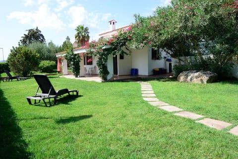 Property building, Patio, Garden, Garden view, sunbed