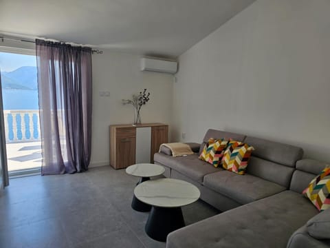Natural landscape, Living room, Seating area, Sea view, air conditioner