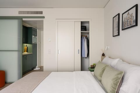 Bed, wardrobe, kitchen