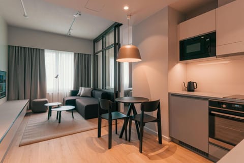 TV and multimedia, Kitchen or kitchenette, Living room, Photo of the whole room, Seating area, Dining area, oven, stove, kitchen