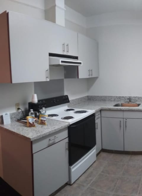 Kitchen or kitchenette, oven, stove