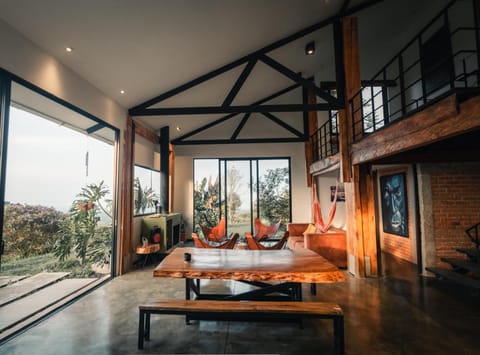 Property building, Patio, Day, Garden, View (from property/room), Living room, Dining area, Garden view, fireplace
