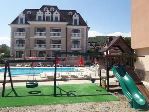 Property building, Day, Children play ground, Swimming pool