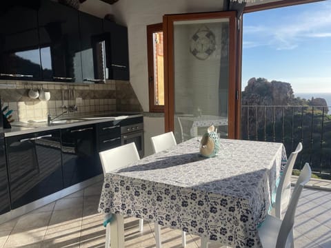 View (from property/room), Balcony/Terrace, Living room, Seating area, Dining area, Sea view