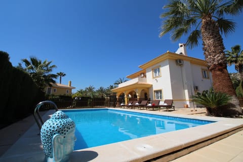 Property building, Patio, Day, Garden, Garden view, Pool view, Swimming pool, sunbed