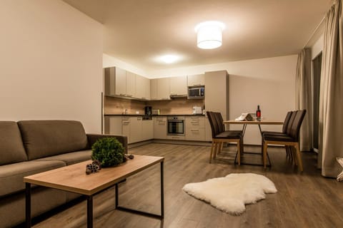 Kitchen or kitchenette, Living room, Seating area, Dining area