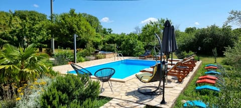 Day, Natural landscape, Garden, Garden view, Pool view, Swimming pool, sunbed