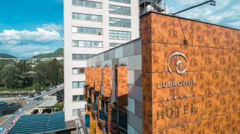 Property building, Facade/entrance, Property logo or sign, Business facilities