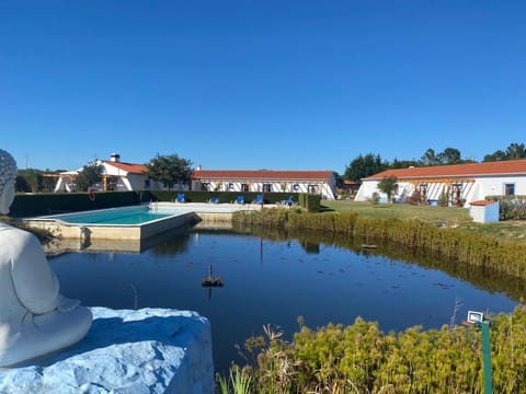 Property building, View (from property/room), Lake view, Swimming pool