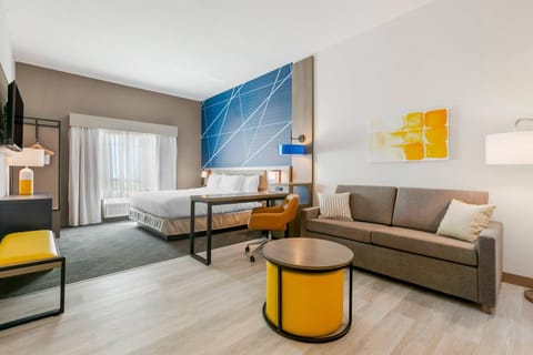 Bed, Living room, Seating area, Bedroom