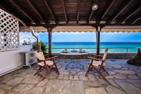 Patio, Day, View (from property/room), Balcony/Terrace, Seating area, Dining area, Beach, Sea view