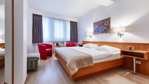 Shower, Bed, Living room, Seating area, Bedroom, towels