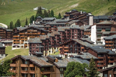 Property building, Day, Neighbourhood, Natural landscape, City view, Mountain view, Street view