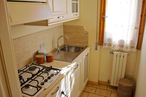 Kitchen or kitchenette, stove