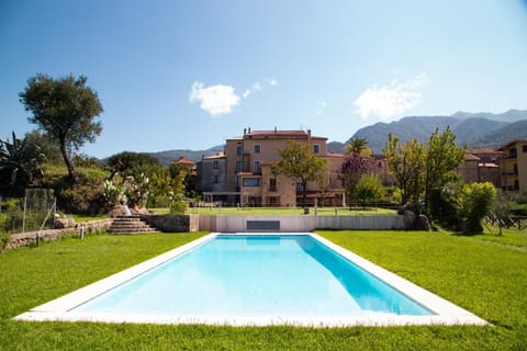 Property building, Facade/entrance, Day, Garden, Solarium, Evening entertainment, Garden view, Pool view, Swimming pool