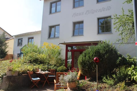 Property building, Facade/entrance, Property logo or sign, Garden, Seating area, Entertainment