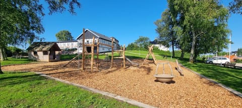 Property building, Spring, Day, Natural landscape, Children play ground, Garden, Garden view
