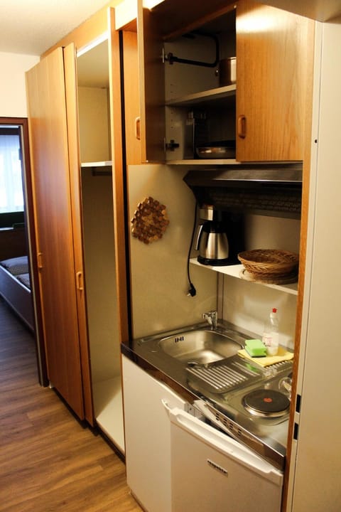 Kitchen or kitchenette, stove