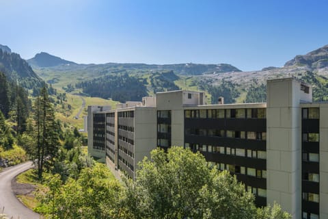 Property building, Nearby landmark, Spring, Day, Natural landscape, Summer, Mountain view
