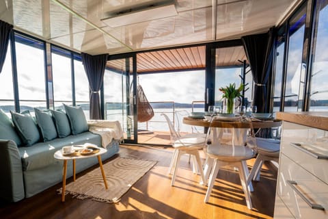 Natural landscape, Living room, Seating area, Dining area, Lake view