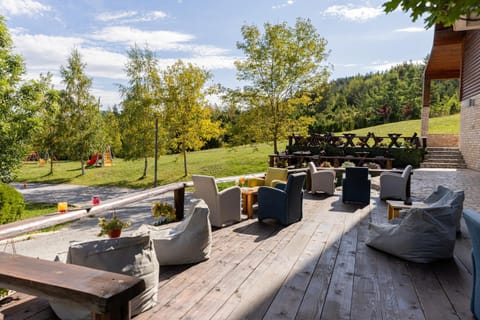 Property building, Balcony/Terrace, Seating area, Seasons