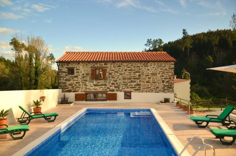 Property building, Patio, Day, Natural landscape, Pool view, Swimming pool, Swimming pool, sunbed
