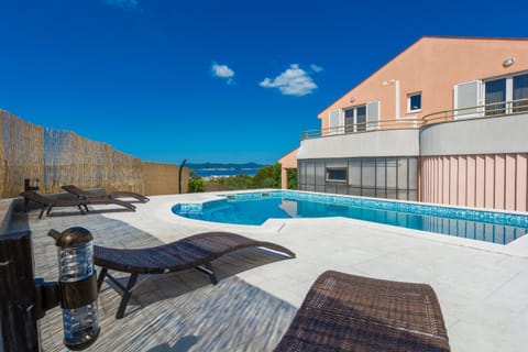 Shower, Patio, Patio, Facade/entrance, Day, Summer, Garden, Garden, Balcony/Terrace, Balcony/Terrace, Seating area, On site, Garden view, Garden view, Pool view, Pool view, Sea view, Sea view, Swimming pool, Swimming pool, Entertainment, Inner courtyard view