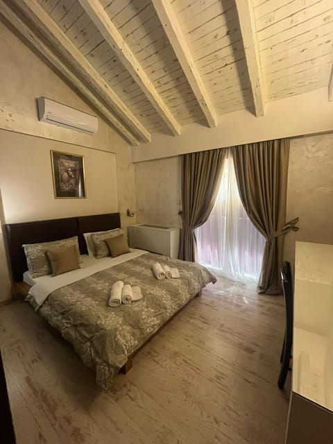 Bed, Photo of the whole room, Bedroom, towels, air conditioner