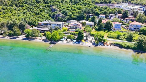 Property building, Nearby landmark, Day, Neighbourhood, Natural landscape, Bird's eye view, Beach, City view, Lake view, River view, Sea view, Street view