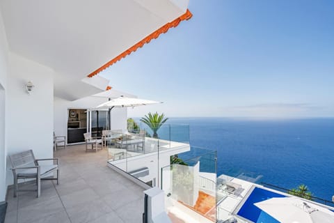 Property building, Patio, Day, Natural landscape, View (from property/room), Balcony/Terrace, Seating area, Pool view, Sea view, Swimming pool, sunbed